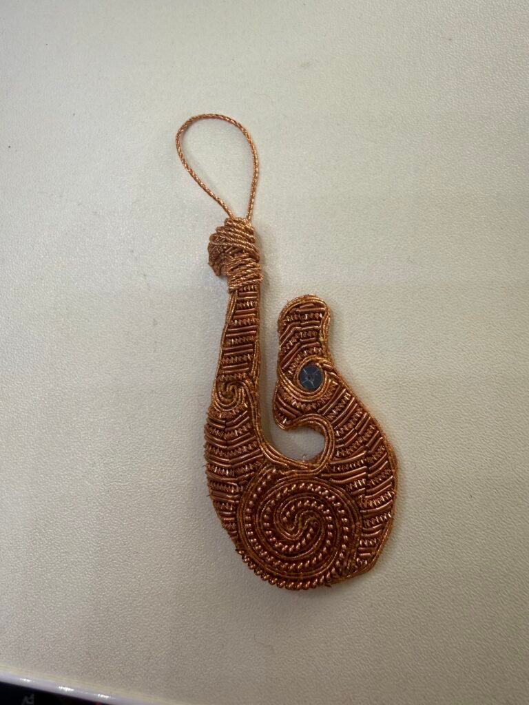 Goldwork embroidery in progress on a craft table