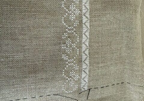 the first rows of a stitched sampler